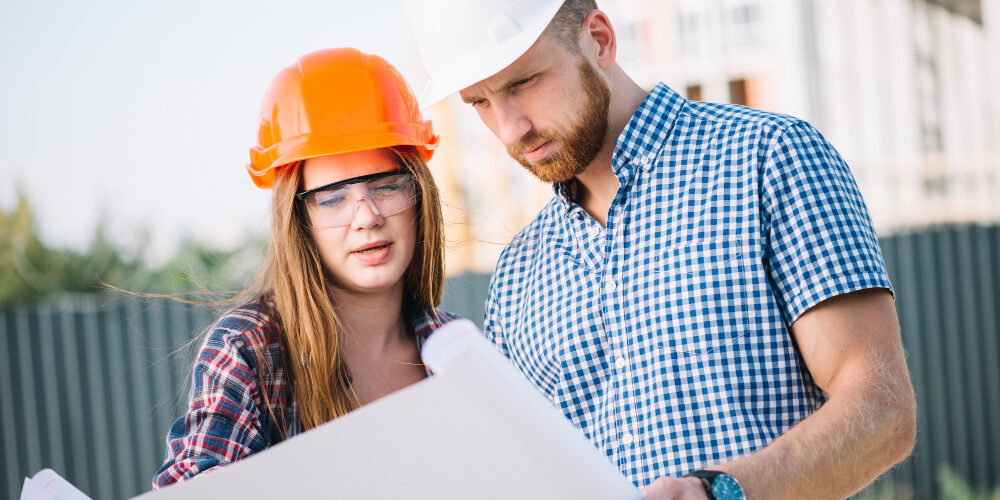 builder-woman-man-blueprint